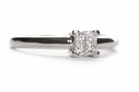 Lot 468 - PLATINUM DIAMOND DRESS RING set with four...