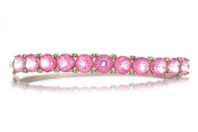 Lot 539 - PINK GEM SET BANGLE