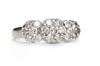 Lot 475 - FOURTEEN CARAT WHITE GOLD DIAMOND CLUSTER RING...