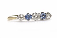 Lot 478 - DIAMOND AND GEM SET RING the linear bezel with...