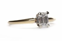 Lot 480 - DIAMOND SOLITAIRE RING the emerald cut diamond...