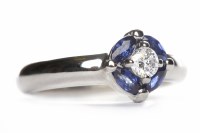 Lot 488 - PLATINUM SAPPHIRE AND DIAMOND RING the central...