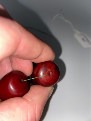 Lot 348 - SET OF CHERRY AMBER BAKELITE NECKLACE