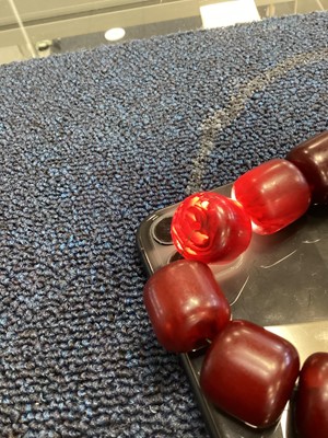 Lot 348 - SET OF CHERRY AMBER BAKELITE NECKLACE