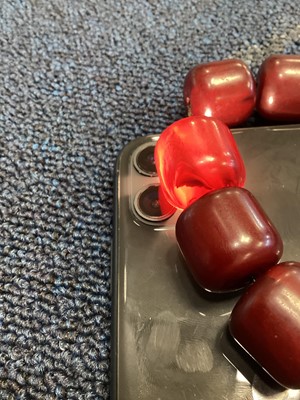 Lot 348 - SET OF CHERRY AMBER BAKELITE NECKLACE