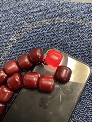 Lot 348 - SET OF CHERRY AMBER BAKELITE NECKLACE