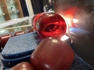 Lot 348 - SET OF CHERRY AMBER BAKELITE NECKLACE