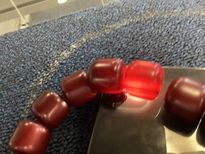 Lot 348 - SET OF CHERRY AMBER BAKELITE NECKLACE