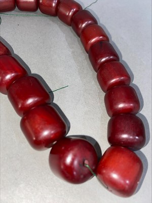 Lot 348 - SET OF CHERRY AMBER BAKELITE NECKLACE