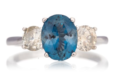 Lot 433 - TOPAZ AND DIAMOND RING