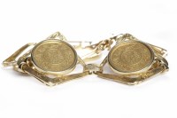 Lot 556 - CHINESE COIN BRACELET set with five Chinese...