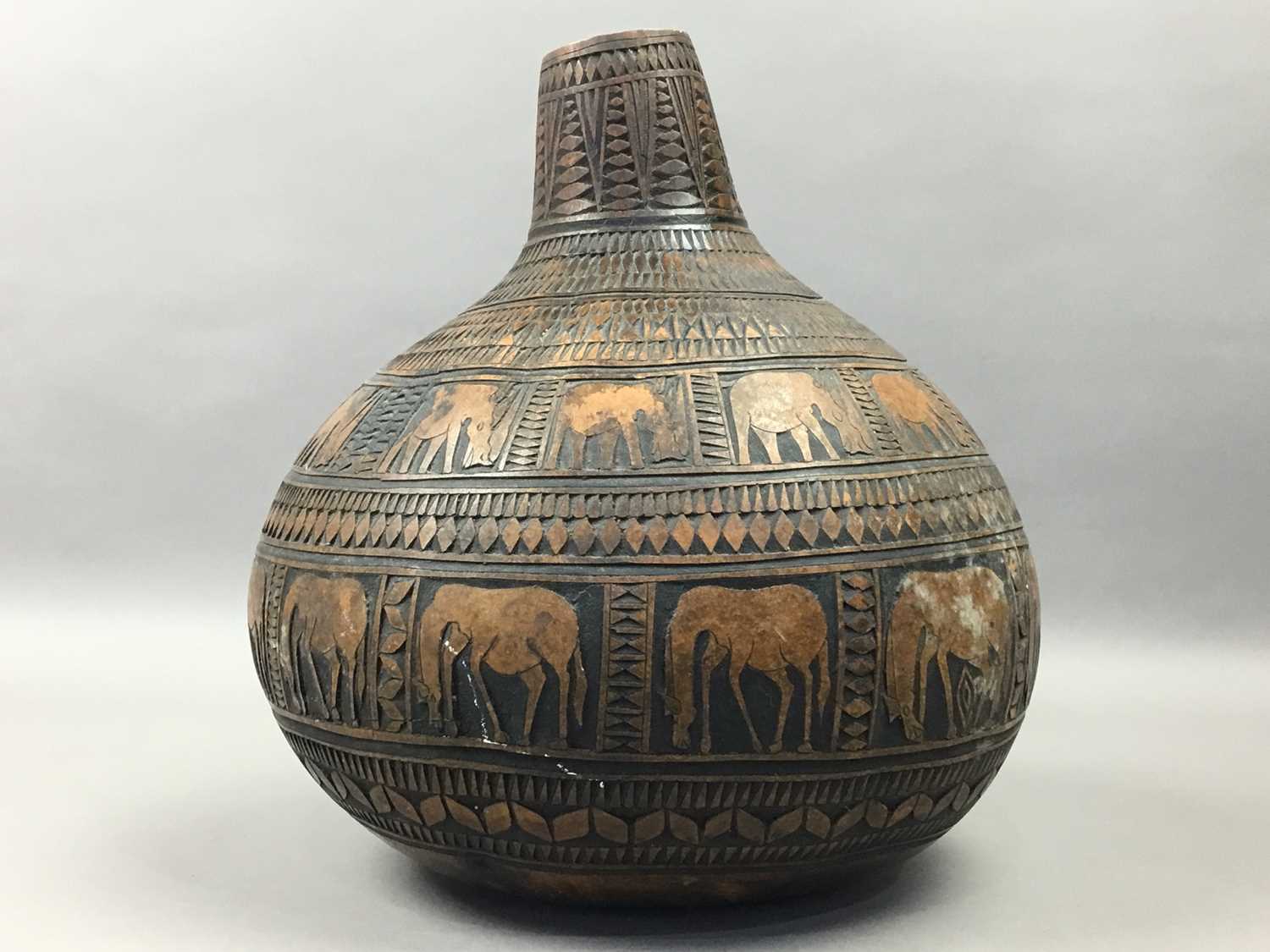 Lot 589 - LARGE AFRICAN CALABASH WATER CONTAINER