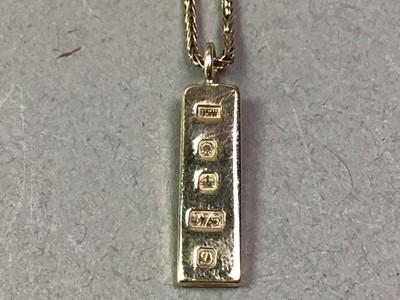Lot 659 - NINE CARAT GOLD INGOT PENDANT