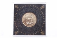 Lot 596 - GOLD 1/4 OZ KRUGERRAND COIN DATED 2014 in a...