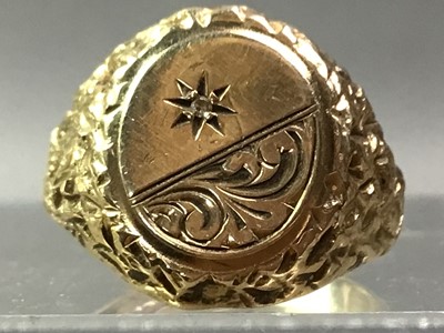 Lot 661 - NINE CARAT GOLD DIAMOND SET SIGNET RING