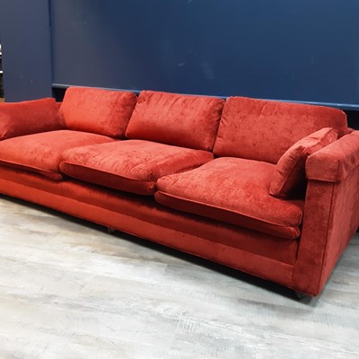 Lot 785 - RED UPHOLSTERED THREE SEAT SETTEE