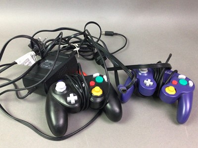 Lot 959 - NINTENDO GAMECUBE, PURPLE CONSOLE, CONTROLLER AND GAMES