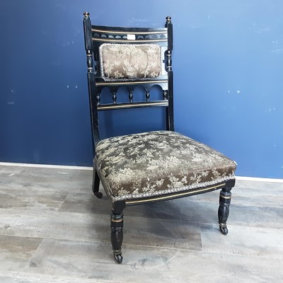 Lot 857 - EBONISED NURSING CHAIR