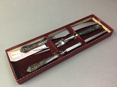 Lot 210 - ELIZABETH II SILVER HANDLED CARVING SET