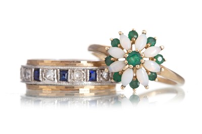 Lot 666 - EMERALD AND OPAL RING