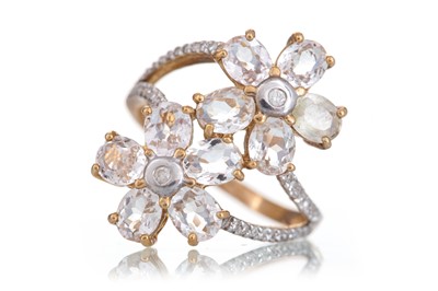 Lot 681 - GEM SET AND DIAMOND DOUBLE FLOWER RING