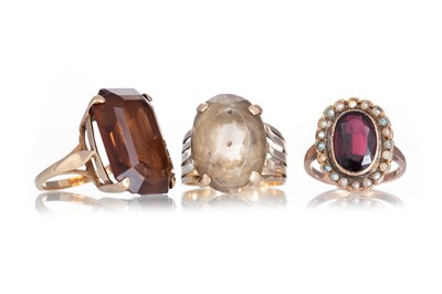 Lot 691 - THREE GEM SET RINGS