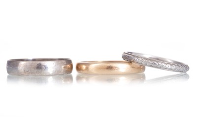 Lot 697 - THREE WEDDING BANDS