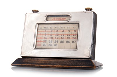 Lot 104 - GEORGE V SILVER MOUNTED PERPETUAL DESK CALENDAR