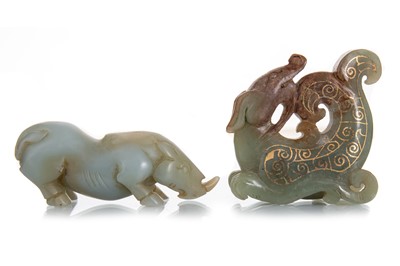 Lot 1201 - TWO CHINESE JADE CARVINGS OF A CHILONG AND RHINO