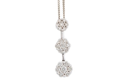 Lot 766 - DIAMOND TRIPLE DAISY CLUSTER PENDANT