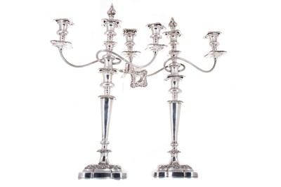 Lot 110 - PAIR OF VICTORIAN SILVER PLATED THREE BRANCH CANDELABRA