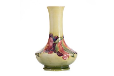 Lot 443 - WILLIAM MOORCROFT (BRITISH, 1872-1945), LEAF & BERRY PATTERN VASE