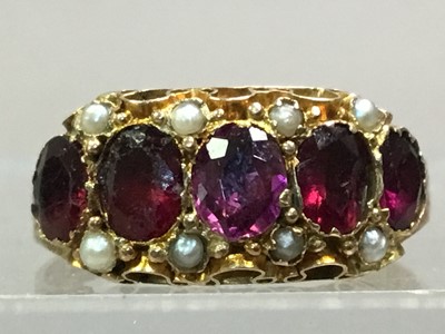 Lot 27 - NINE CARAT GOLD RHODOLITE GARNET AND PEARL RING