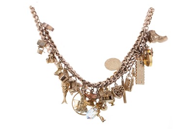 Lot 426 - GOLD CHARM NECKLACE