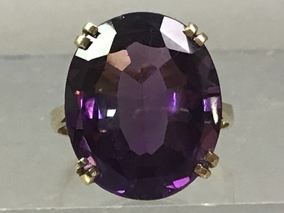 Lot 239 - NINE CARAT GOLD AMETHYST RING