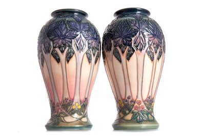 Lot 497 - SALLY TUFFIN FOR MOORCROFT POTTERY, TWO 'CLUNY' PATTERN VASES