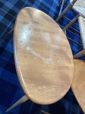 Lot 506 - ERCOL, NEST OF THREE MODEL 354 'PEBBLE' ELM TABLES