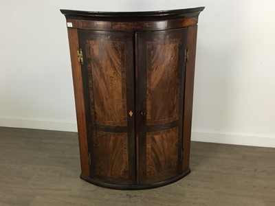 Lot 449 - GEORGIAN WALNUT BOW FRONT CORNER CABINET