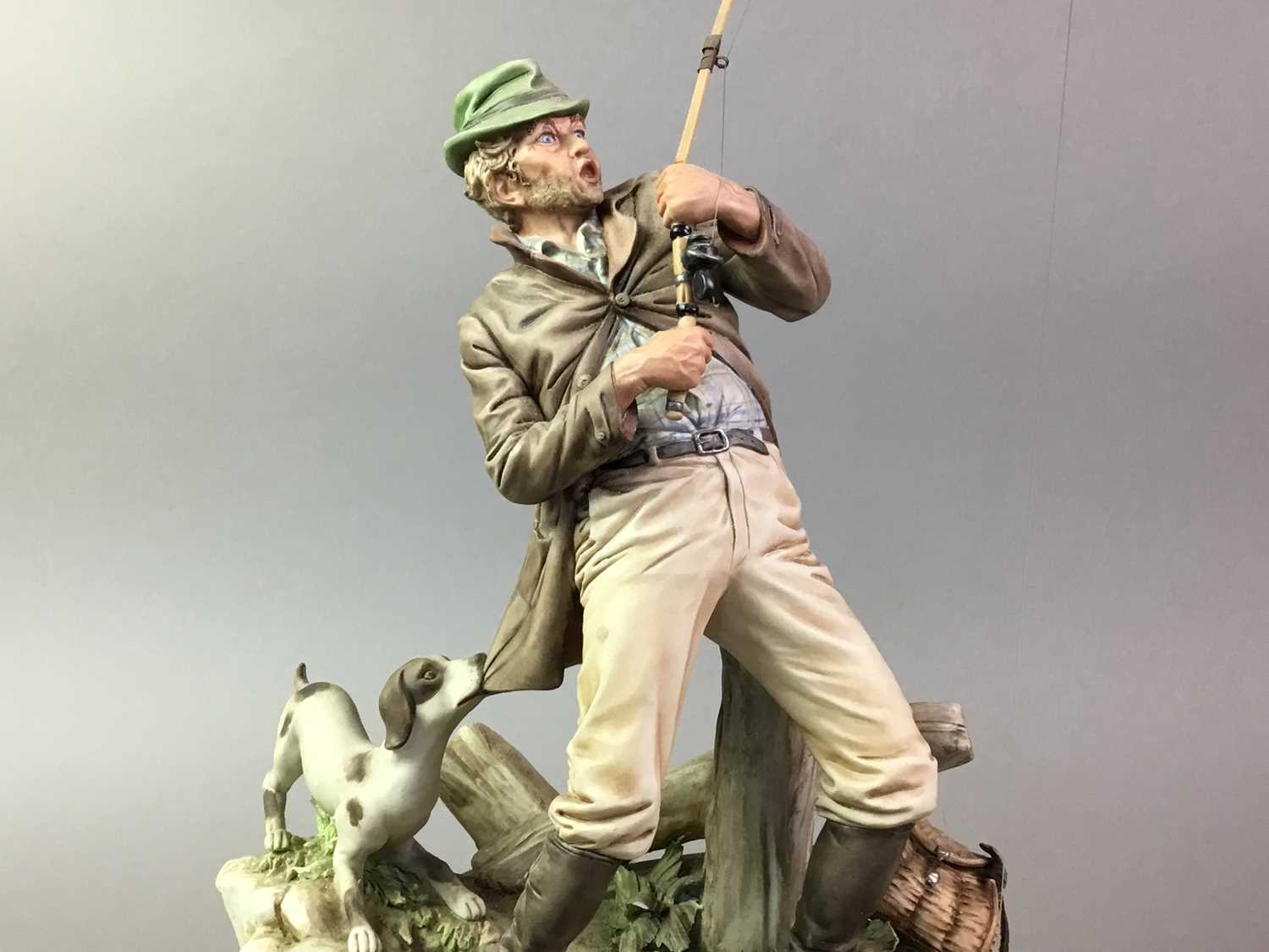 Lot 402 - CAPO DI MONTE FIGURE OF A FISHERMAN