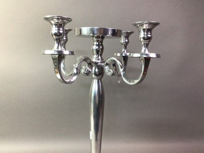 Lot 556 - TWO PLATED CANDELABRUM AND A CAKE STAND