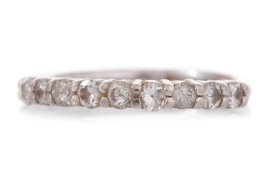 Lot 555 - DIAMOND HALF ETERNITY RING