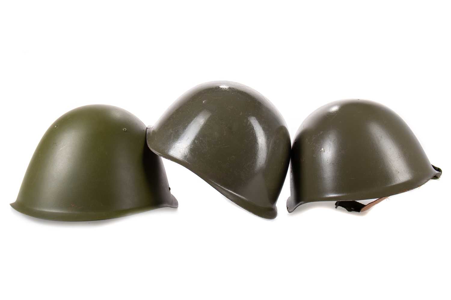 Lot 73 - THREE RUSSIAN SSh-68-TYPE HELMETS