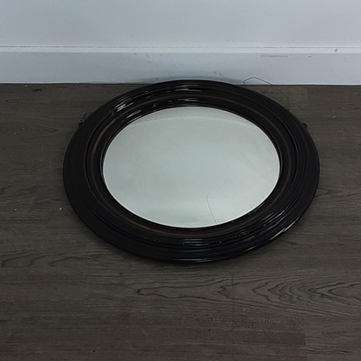 Lot 790 - EBONISED CIRCULAR CONVEX WALL MIRROR OF REGENCY DESIGN