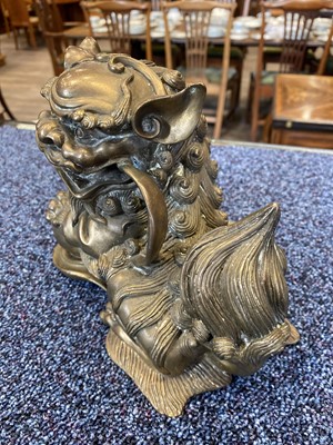 Lot 1097 - OPPOSING PAIR OF CHINESE POLISHED BRONZE FO DOGS