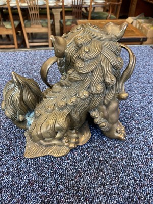 Lot 1097 - OPPOSING PAIR OF CHINESE POLISHED BRONZE FO DOGS