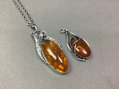 Lot 339 - TWO POLISH BALTIC AMBER PENDANTS