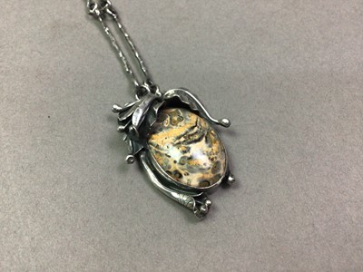 Lot 340 - WHITE METAL AND HARDSTONE PENDANT