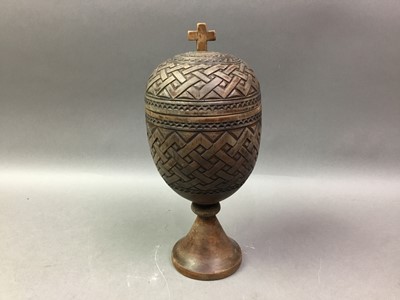 Lot 360 - CARVED COCONUT ON STAND