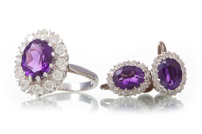 Lot 1196 - AMETHYST AND DIAMOND RING