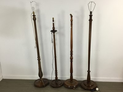 Lot 454 - FOUR MAHOGANY STANDARD LAMPS